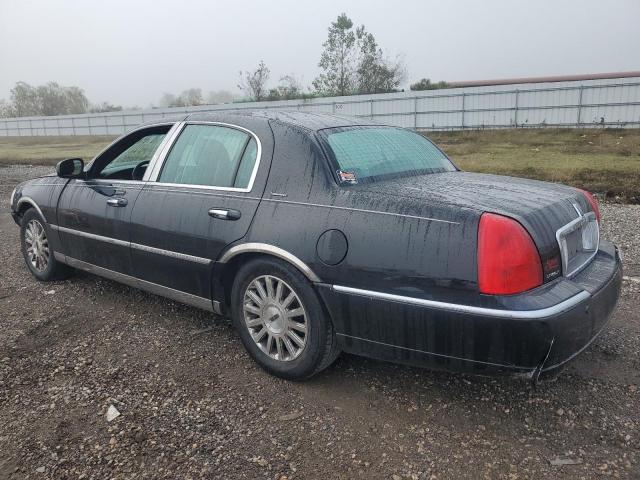 Photo 2 from auction – 2004 LINCOLN TOWN CAR E with VIN 1LNHM81WX4Y627526