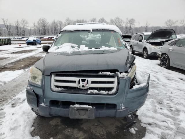 Photo 5 from auction – 2006 HONDA PILOT LX with VIN 2HKYF18126H524766
