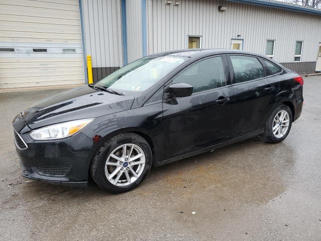 FORD FOCUS SE 2018 with VIN 1FADP3F22JL238820 - Photo from auction