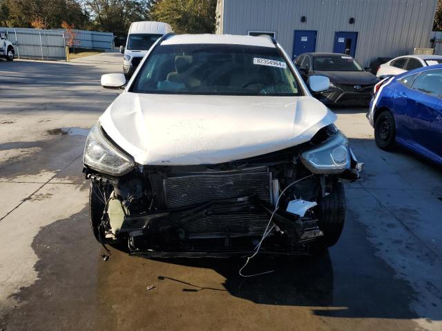 Photo 5 from auction – 2017 HYUNDAI SANTA FE S with VIN 5NMZU3LB3HH020667