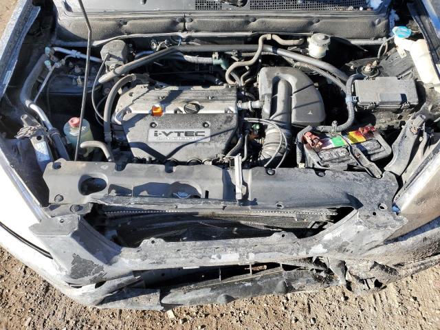 Photo 12 from auction – 2004 HONDA CR-V LX with VIN JHLRD68474C008027