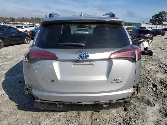 Photo 6 from auction – 2017 TOYOTA RAV4 HV LE with VIN JTMRJREV4HD148797