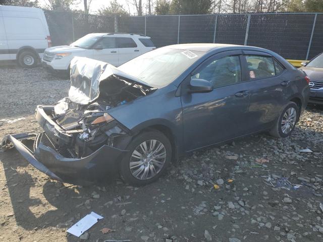 TOYOTA COROLLA L 2014 with VIN 5YFBURHE4EP075704 - Photo from auction
