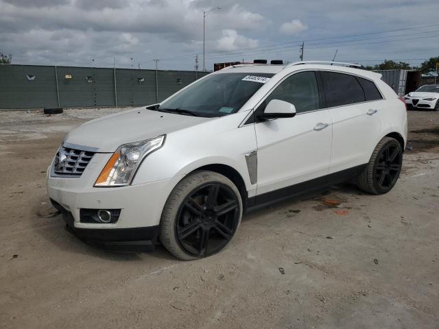 CADILLAC SRX PERFOR 2014 with VIN 3GYFNCE3XES658676 - Photo from auction