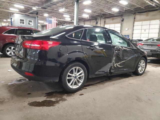 Photo 3 from auction – 2018 FORD FOCUS SE with VIN 1FADP3F2XJL270284