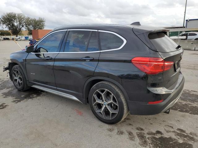 Photo 2 from auction – 2016 BMW X1 XDRIVE2 with VIN WBXHT3C30GP889369