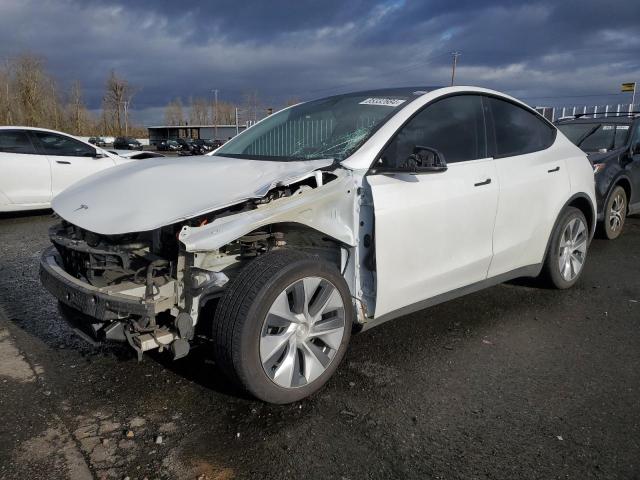 TESLA MODEL Y 2022 with VIN 7SAYGDEE8NF556384 - Photo from auction