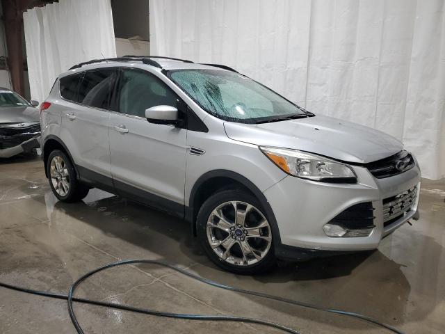 Photo 4 from auction – 2014 FORD ESCAPE SE with VIN 1FMCU9G97EUA59892