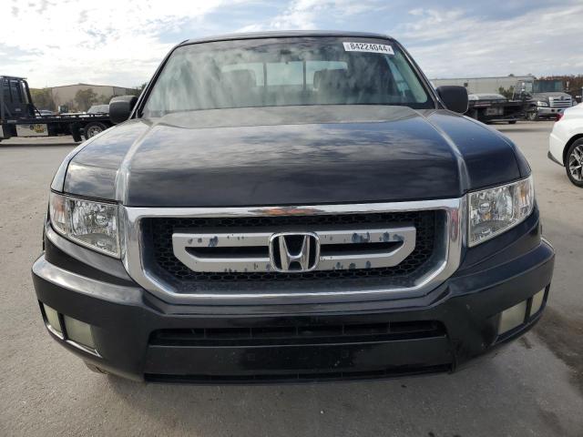 Photo 5 from auction – 2010 HONDA RIDGELINE with VIN 5FPYK1F57AB010721
