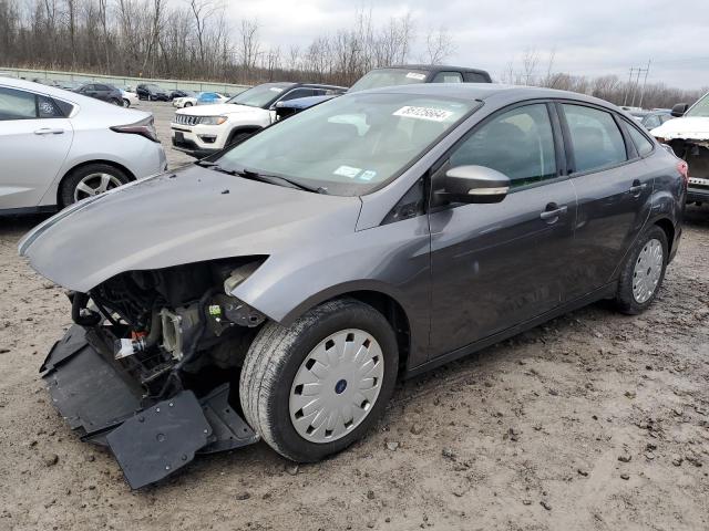 FORD FOCUS SE 2014 with VIN 1FADP3F23EL217108 - Photo from auction