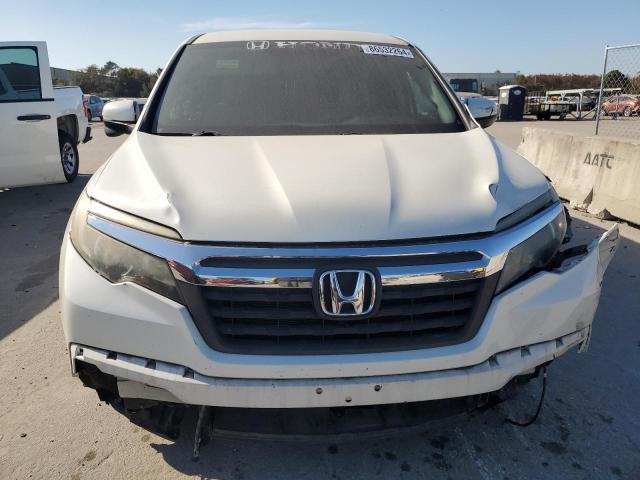 Photo 5 from auction – 2017 HONDA RIDGELINE with VIN 5FPYK2F60HB007748
