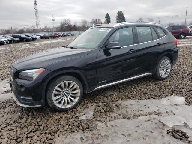 BMW X1 XDRIVE2 2015 with VIN WBAVL1C57FVY36469 - Photo from auction