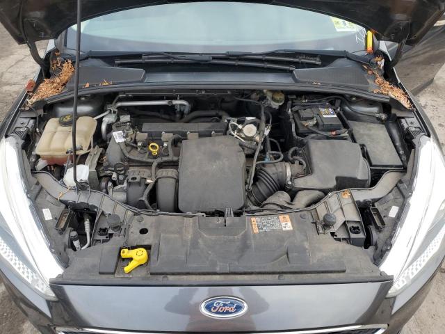 Photo 11 from auction – 2016 FORD FOCUS SE with VIN 1FADP3K29GL389118