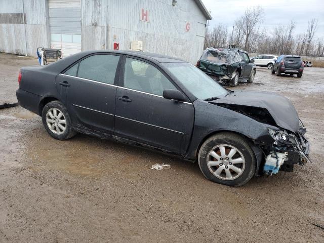 Photo 4 from auction – 2003 TOYOTA CAMRY LE with VIN JTDBF30K830091453
