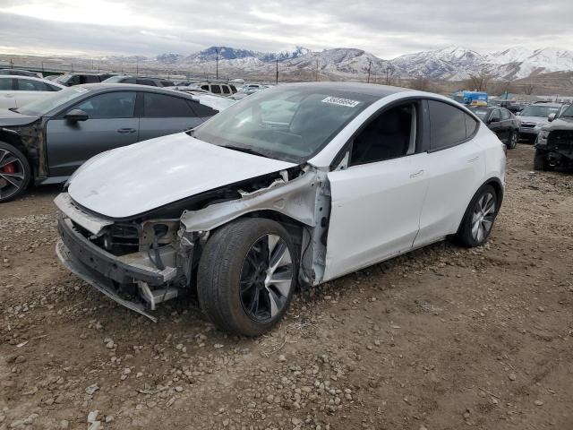 TESLA MODEL Y 2021 with VIN 5YJYGAEE2MF208350 - Photo from auction