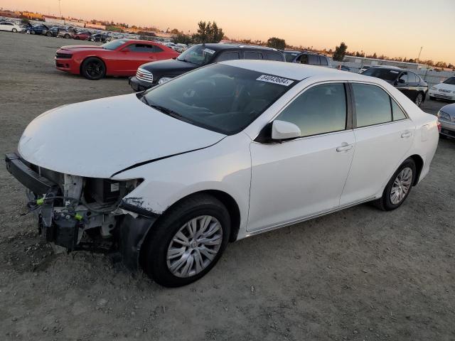 TOYOTA CAMRY L 2014 with VIN 4T4BF1FK4ER444411 - Photo from auction