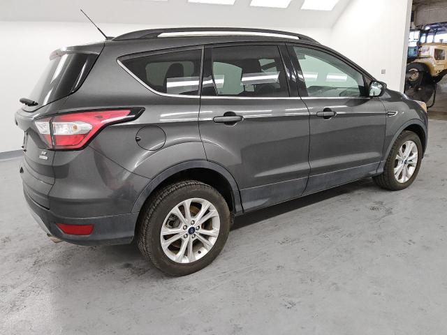 Photo 3 from auction – 2018 FORD ESCAPE SE with VIN 1FMCU0GD4JUC90792