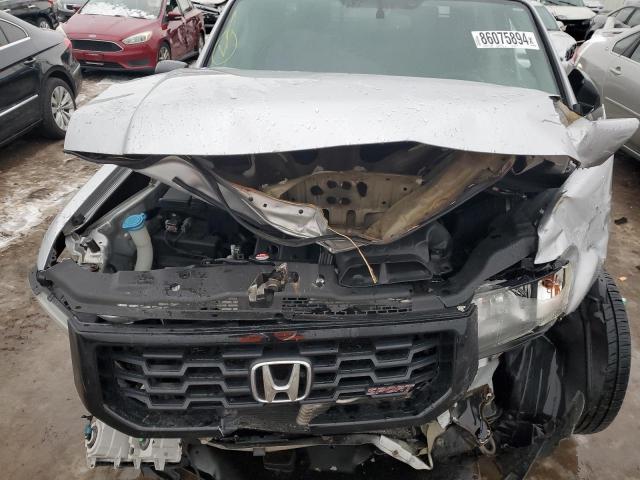Photo 11 from auction – 2014 HONDA RIDGELINE with VIN 5FPYK1F72EB006857
