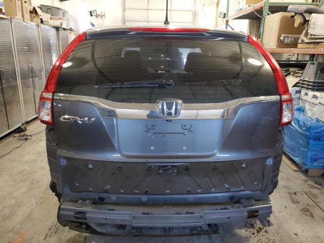 Photo 6 from auction – 2015 HONDA CR-V LX with VIN 3CZRM3H38FG708815