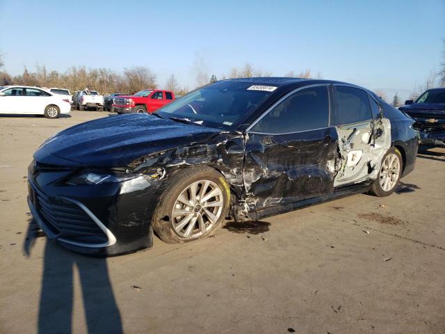 TOYOTA CAMRY LE 2023 with VIN 4T1C11AK2PU168883 - Photo from auction