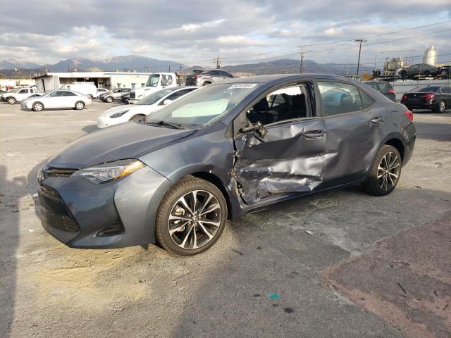 TOYOTA COROLLA L 2018 with VIN 5YFBURHE6JP843239 - Photo from auction