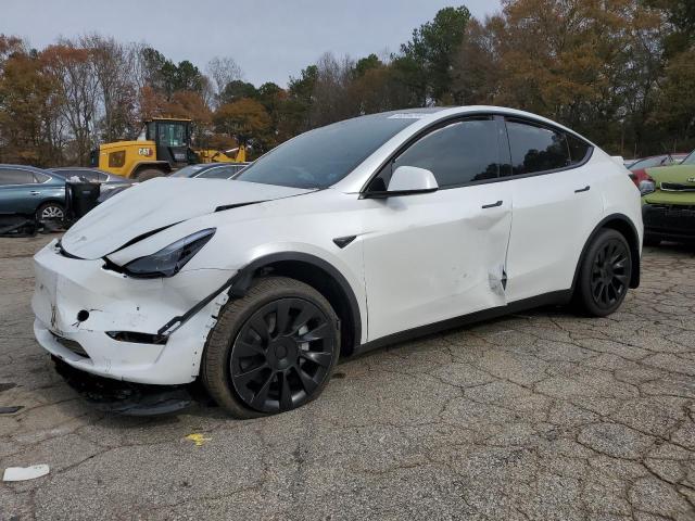 TESLA MODEL Y 2024 with VIN 7SAYGDEE5RA332380 - Photo from auction