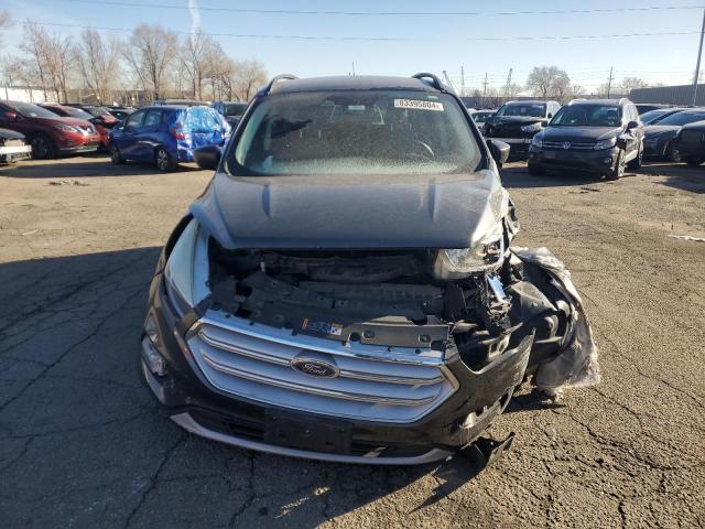 Photo 5 from auction – 2018 FORD ESCAPE SE with VIN 1FMCU9GD9JUA86610