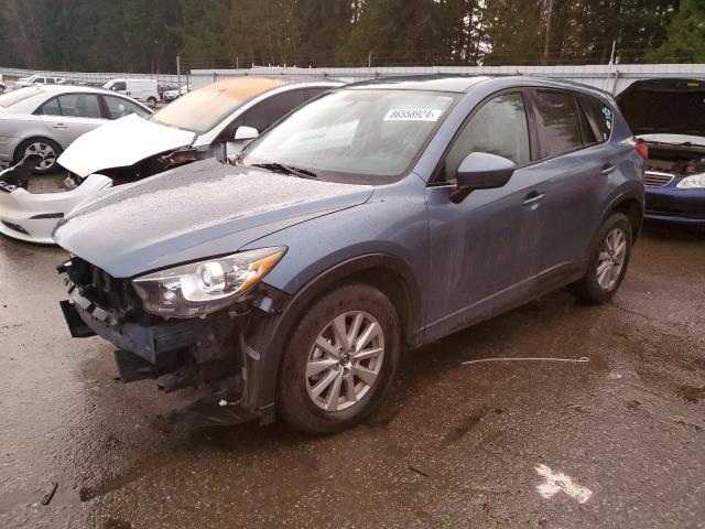 MAZDA CX-5 TOURI 2015 with VIN JM3KE4CY4F0431007 - Photo from auction