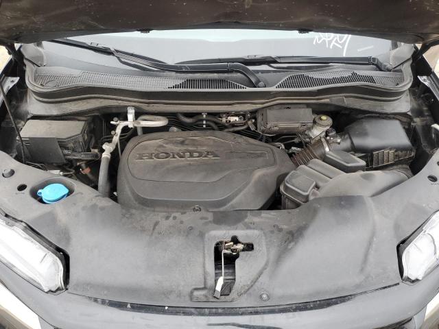 Photo 12 from auction – 2021 HONDA PASSPORT E with VIN 5FNYF8H03MB027396