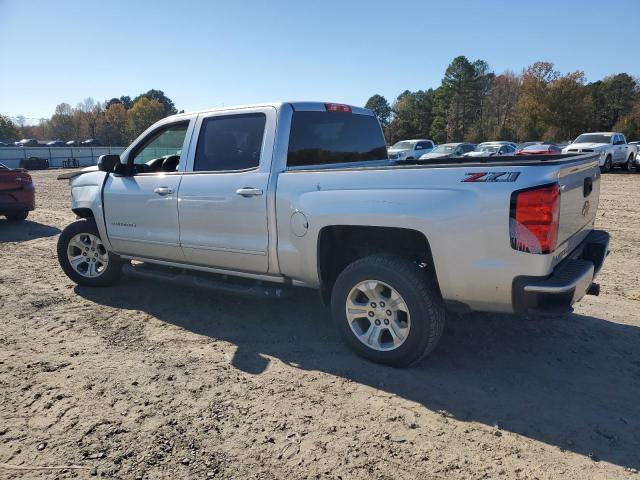 Photo 2 from auction – 2018 CHEVROLET SILVERADO with VIN 3GCUKREC1JG149792