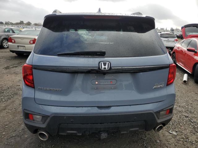 Photo 6 from auction – 2022 HONDA PASSPORT E with VIN 5FNYF8H09NB014539
