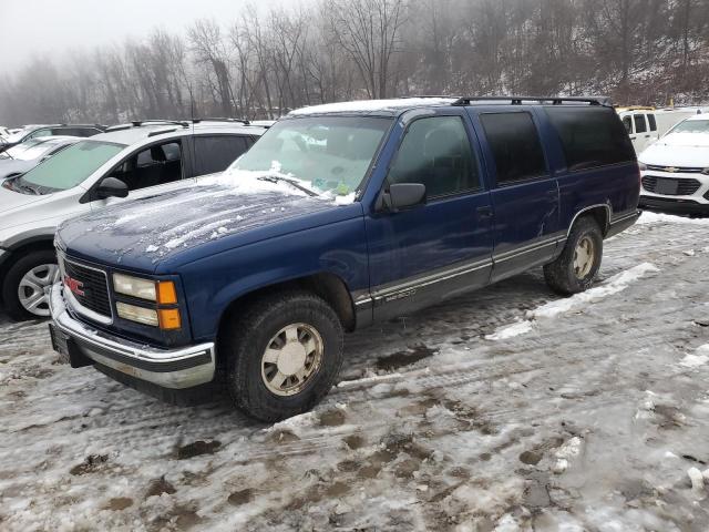 GMC SUBURBAN 1999 with VIN 1GKEC16R5XJ778103 - Photo from auction