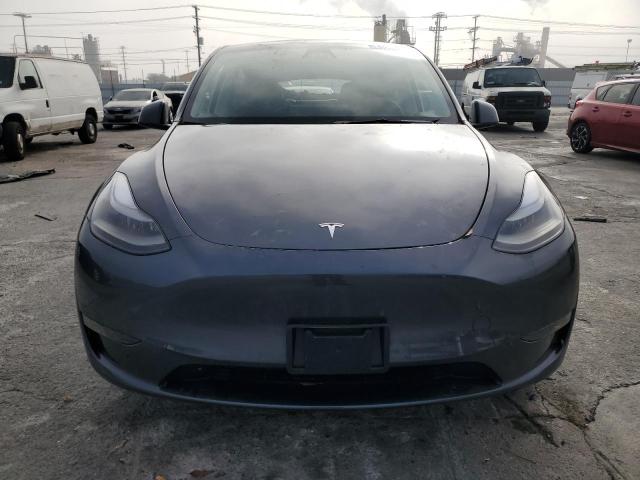 Photo 5 from auction – 2023 TESLA MODEL Y with VIN 7SAYGDED2PF965636