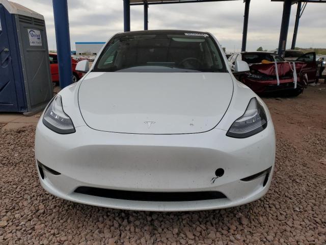 Photo 5 from auction – 2023 TESLA MODEL Y with VIN 7SAYGAEE8PF615709