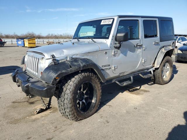 JEEP WRANGLER U 2011 with VIN 1J4BA3H10BL590233 - Photo from auction