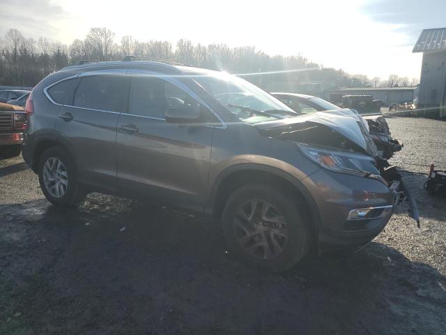 Photo 4 from auction – 2015 HONDA CR-V EXL with VIN 5J6RM4H73FL010141