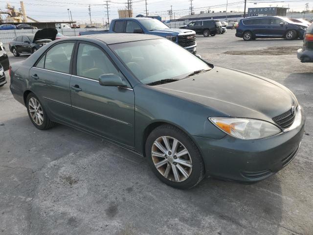 Photo 4 from auction – 2002 TOYOTA CAMRY LE with VIN JTDBE32K220135476