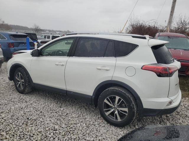 Photo 2 from auction – 2016 TOYOTA RAV4 XLE with VIN JTMRFREV0GJ095288