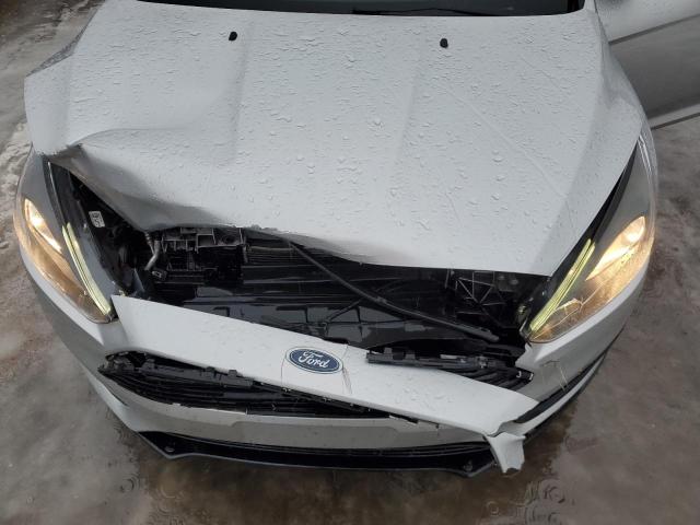Photo 11 from auction – 2018 FORD FOCUS SE with VIN 1FADP3FE3JL305869