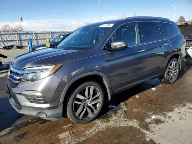 HONDA PILOT ELIT 2016 with VIN 5FNYF6H02GB109693 - Photo from auction