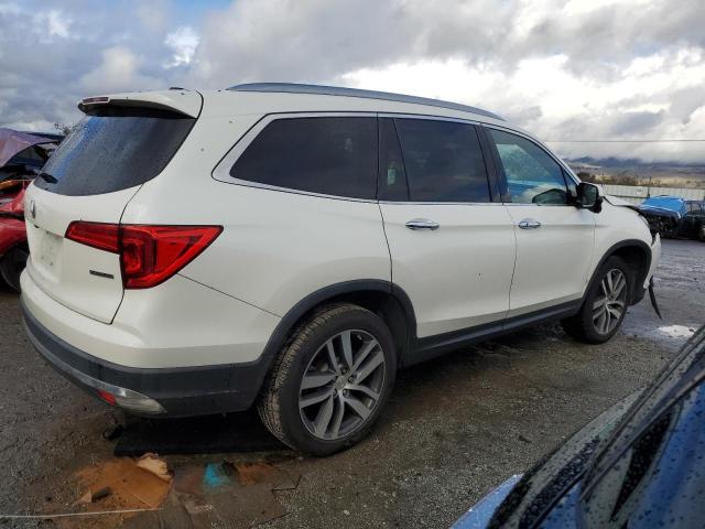 Photo 3 from auction – 2017 HONDA PILOT TOUR with VIN 5FNYF5H95HB029492
