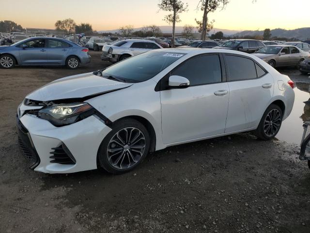 TOYOTA COROLLA L 2019 with VIN 5YFBURHE3KP868262 - Photo from auction