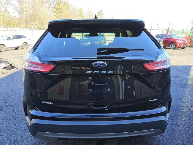 Photo 6 from auction – 2021 FORD EDGE SEL with VIN 2FMPK4J94MBA54074