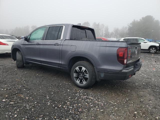 Photo 2 from auction – 2020 HONDA RIDGELINE with VIN 5FPYK3F56LB029923