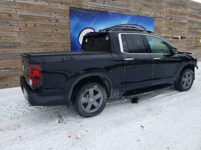 Photo 3 from auction – 2021 HONDA RIDGELINE with VIN 5FPYK3F79MB010074