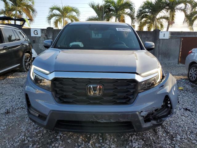 Photo 5 from auction – 2022 HONDA PASSPORT E with VIN 5FNYF7H55NB004533