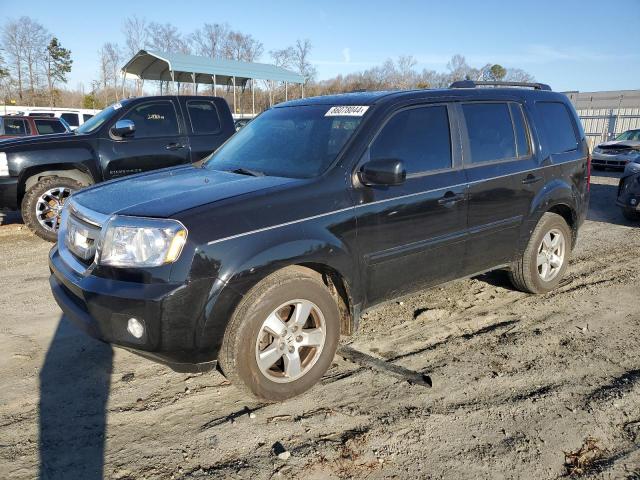 HONDA PILOT EXL 2011 with VIN 5FNYF4H60BB090529 - Photo from auction