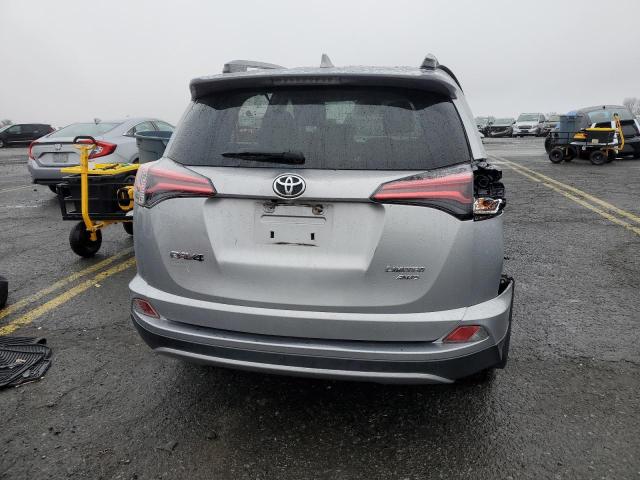 Photo 6 from auction – 2018 TOYOTA RAV4 LIMIT with VIN JTMDFREV3JJ242379