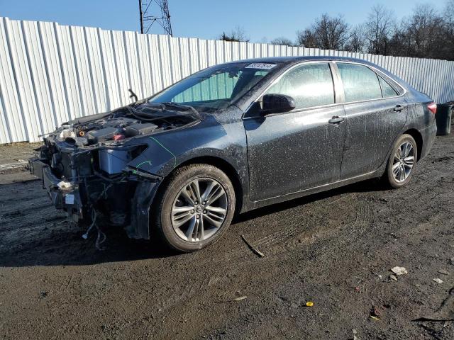 TOYOTA CAMRY LE 2016 with VIN 4T1BF1FKXGU127973 - Photo from auction