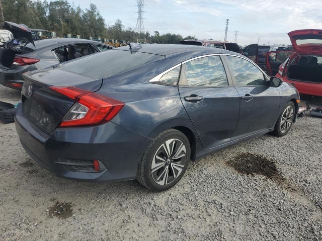 Photo 3 from auction – 2017 HONDA CIVIC EXL with VIN 19XFC1F75HE028357
